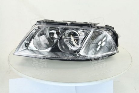 Передня фара tyc 206244052B на Фольксваген Пассат б5