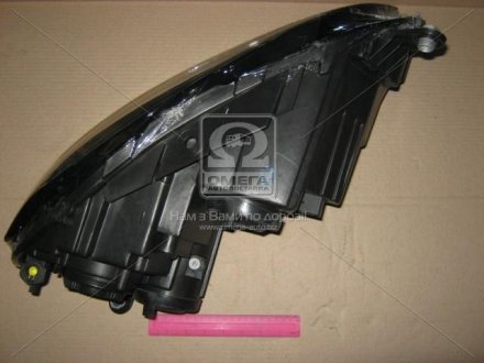 Передняя фара tyc 20C516052B на Фольксваген Пассат б7