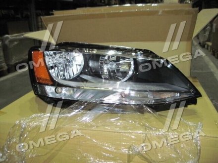 Передняя фара tyc 20C561001N на Фольксваген Джетта 6