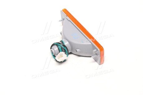 Указ. пов. в бамп. лев.=прав. MAZDA 323 85-89 tyc 121243B06B