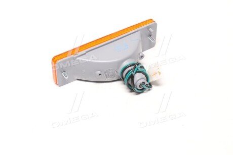 Указ. пов. в бамп. лев.=прав. MAZDA 323 85-89 tyc 121243B06B